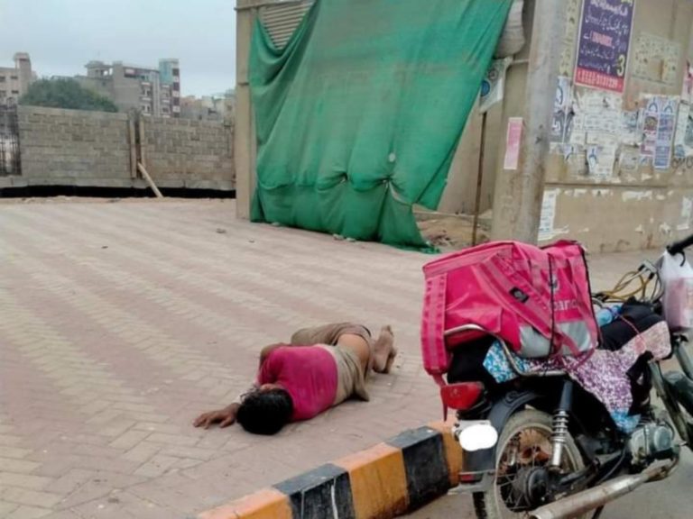 Viral Picture Of Food Panda Delivery Boy Sleeping On Footpath Waiting For Next Order Leaves Social Media In Sorrow